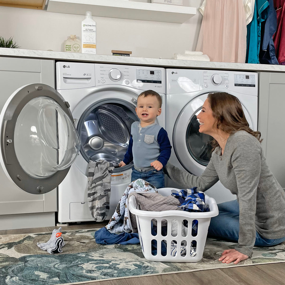 Mom and son playing in laundry room
