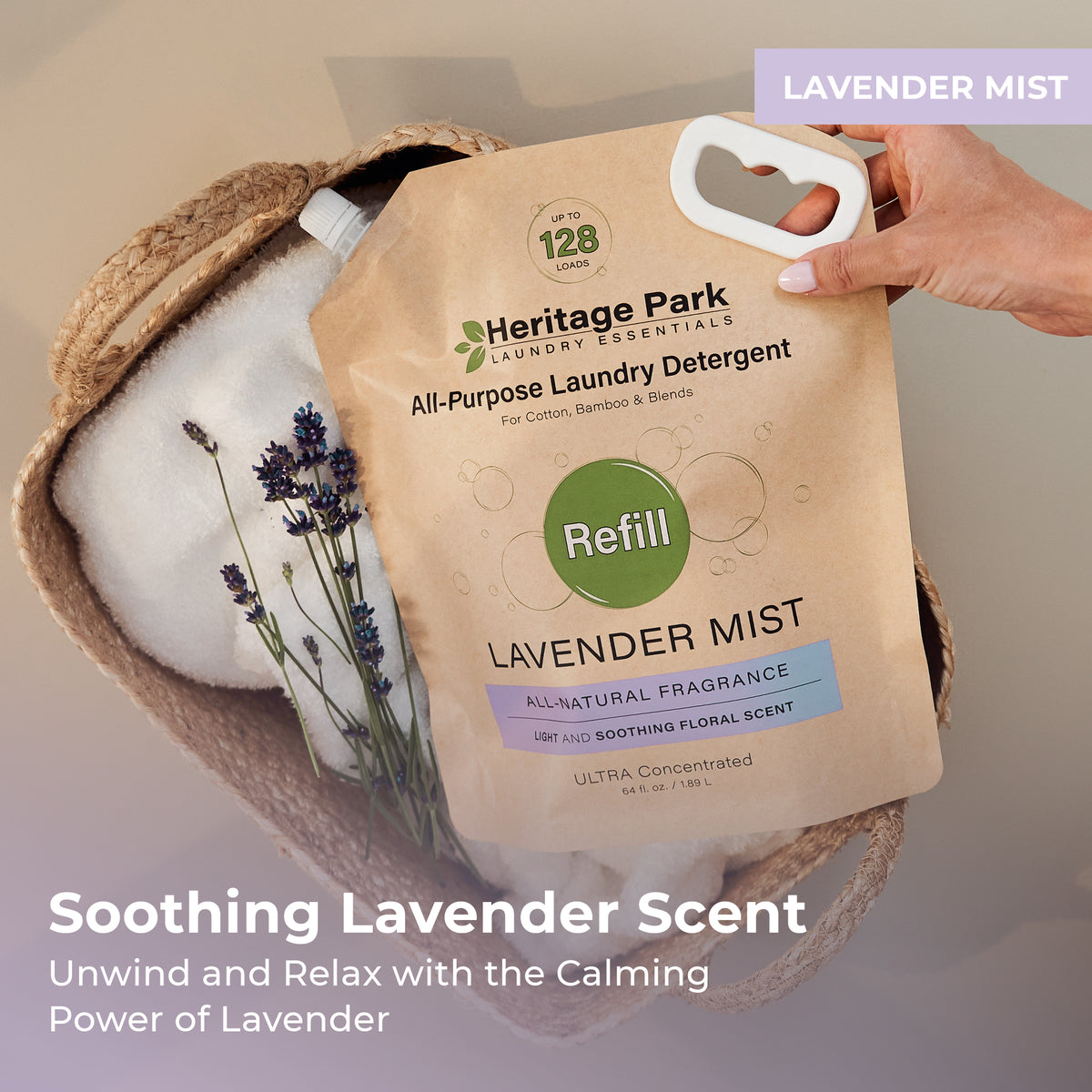 Lavender Mist Heritage Park All Purpose Laundry Detergent refill pack on a laundry basket
