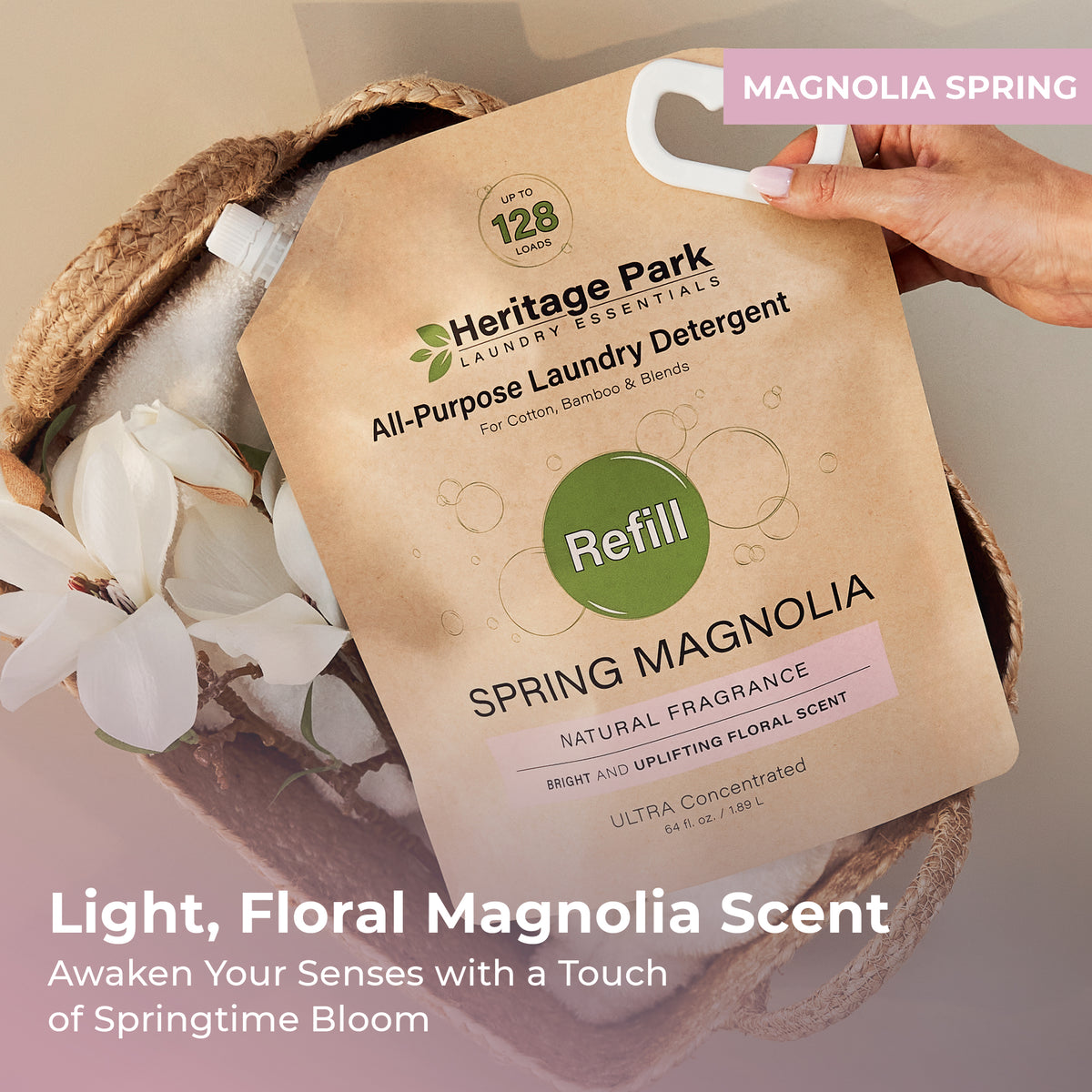 Spring Magnolia Heritage Park All Purpose Laundry Detergent refill pack on a laundry basket