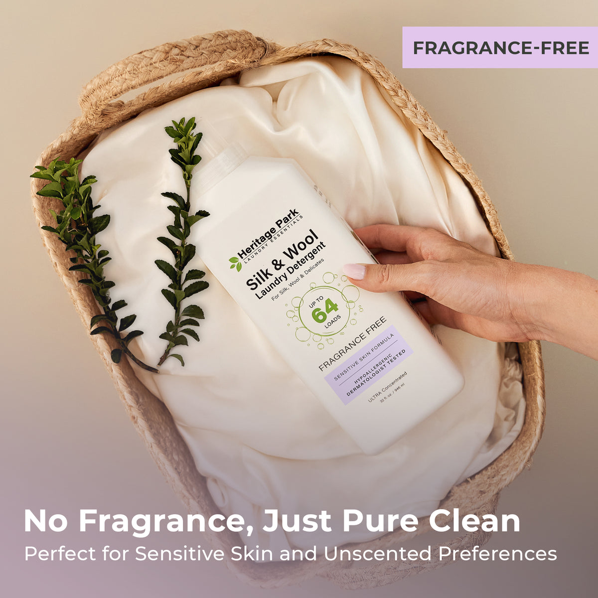 32oz bottle of Fragrance Free Heritage Park Silk and Wool Laundry Detergent on a laundry basket