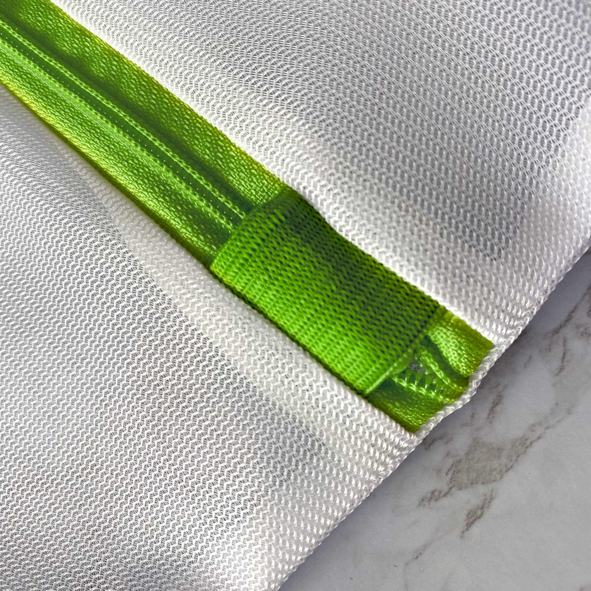 Hidden zipper of the Heritage Park premium mesh laundry bag