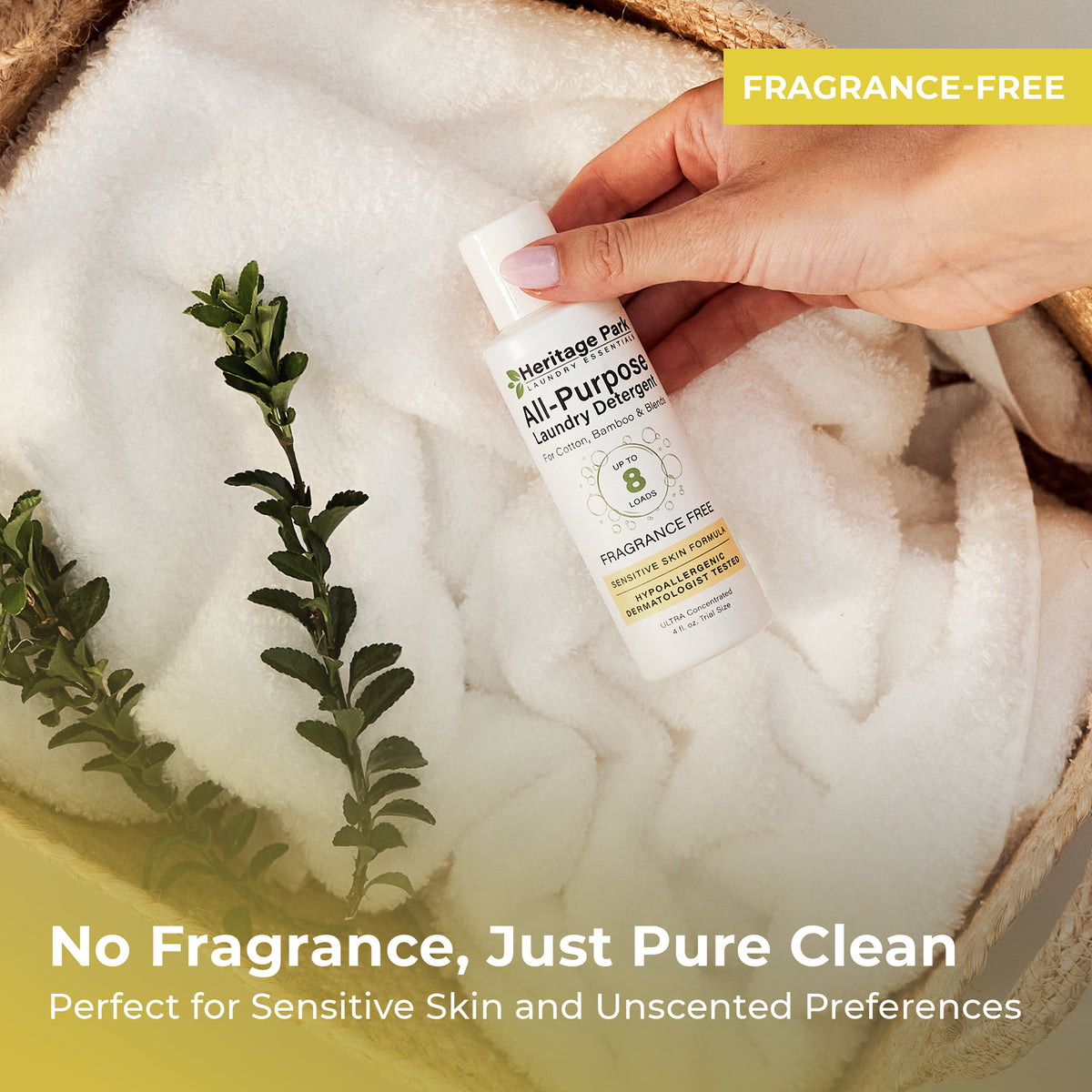 4oz bottle of Fragrance Free Heritage Park All Purpose Laundry Detergent on a laundry basket
