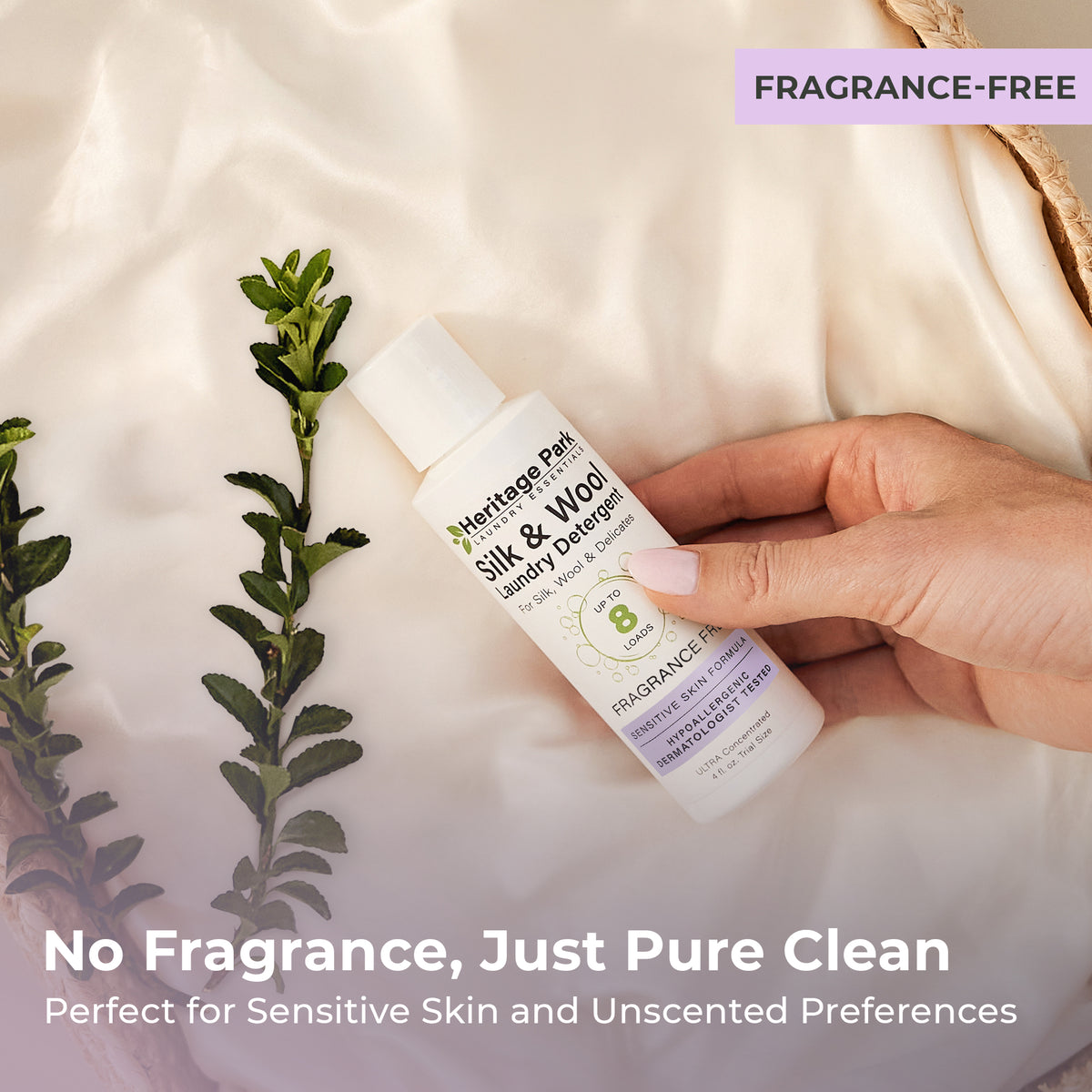 4oz bottle of Fragrance Free Heritage Park All Purpose Laundry Detergent on a laundry basket