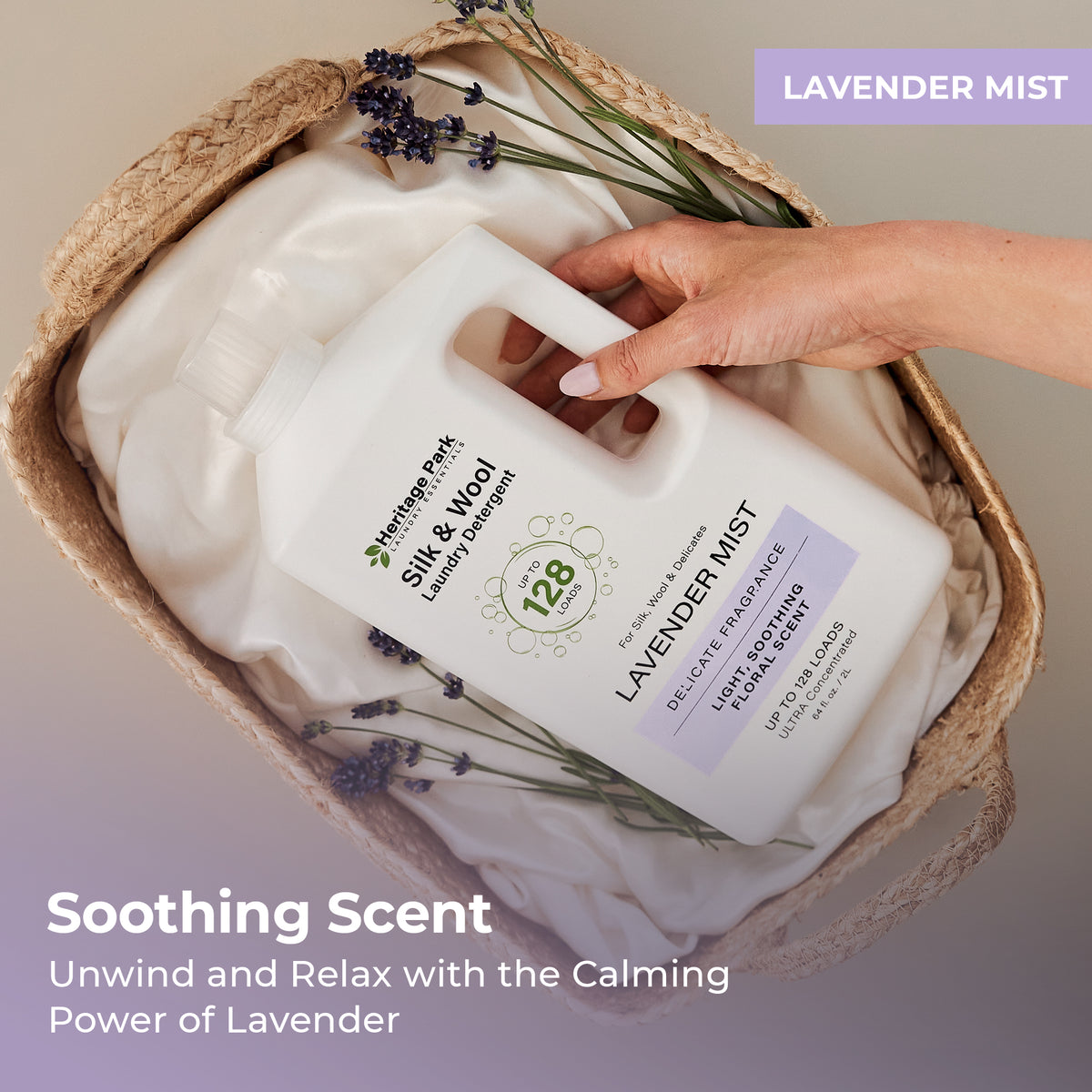 64oz bottle of Heritage Park Silk and Wool Laundry Detergent with lavender mist Fragrance on a laundry basket